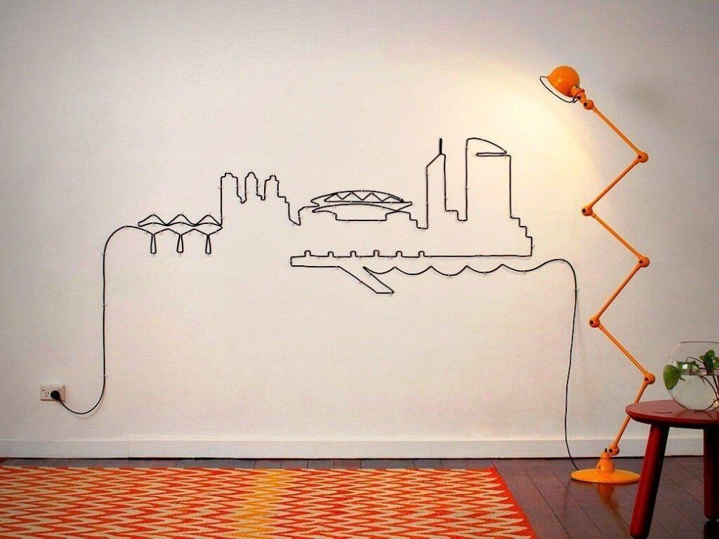 провода под телевизор на стене в форме рисунка
